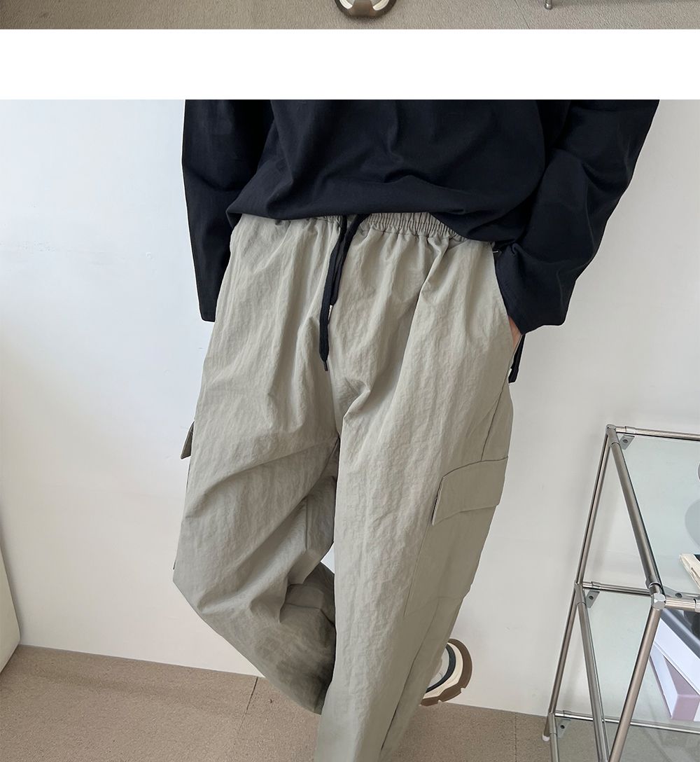 코븐 남자 나일론 카고 와이드 팬츠 SD-220974 남성바지 남자바지 와이드바지 남성와이드바지 남자와이드바지 패션와이드바지 밴딩와이드바지 와이드팬츠 통바지 남성통바지